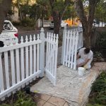 Detail painting of timber gate and fence in Marrickville