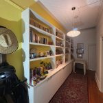 Interior hallway in Marrickville home before repaint with bold yellow wall