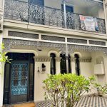 Heritage house facade repaint in Petersham with ornate balcony detail