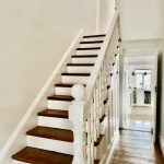 Staircase repaint in Petersham with timber treads and white balustrade