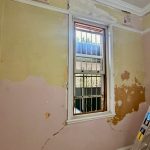 Interior wall damage and preparation work before painting in Annandale heritage home