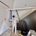 Interior painter completing stairwell and custom wall painting works in Enmore NSW