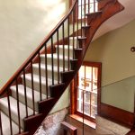 Curved heritage staircase repaint with timber detailing in Balmain