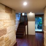 Interior repaint near sandstone wall and staircase in Balmain heritage home