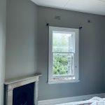 Finished bedroom with smooth grey walls in Dulwich Hill heritage house