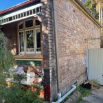 Exterior brick wall before painting in Dulwich Hill heritage house