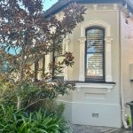 Heritage home exterior in Dulwich Hill with restored bay window and detailed render finish