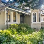 Full front view of heritage home in Dulwich Hill with garden and verandah