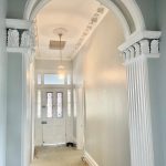 Finished hallway with heritage archway and restored detailing in Dulwich Hill