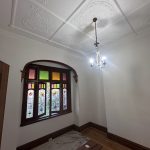 Interior heritage room restoration with stained glass and decorative ceiling in Hurlstone Park NSW