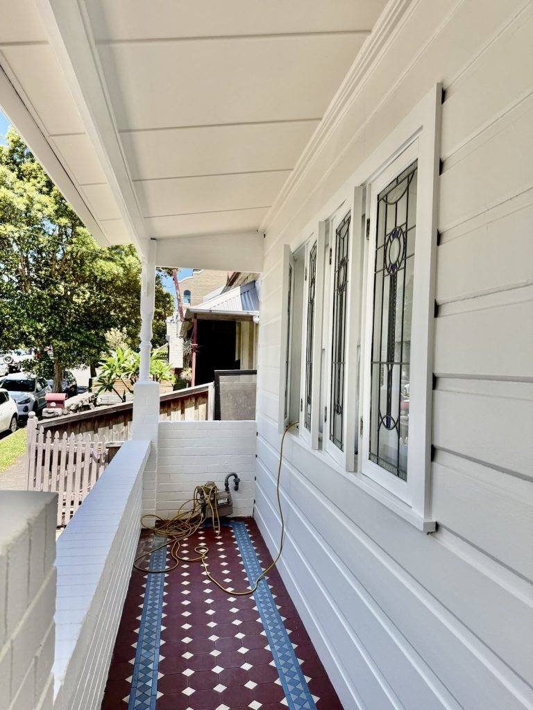 Painted verandah and weatherboard detailing on heritage home in Rozelle