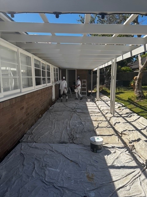 Exterior painting preparation with surfaces protected in Haberfield Sydney