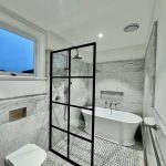 Bathroom interior in Ashbury home with marble finishes, shower screen and detailed interior finishes