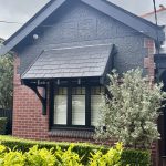 Decorative gable and exterior timber painting on Croydon heritage home