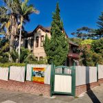 Exterior painting of heritage house in Douglas Street Stanmore with traditional colour scheme