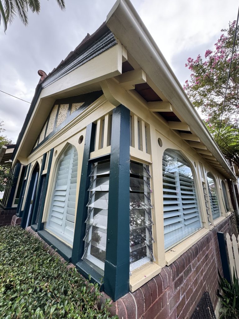 Detailed exterior heritage painting and timber feature restoration in Summer Hill