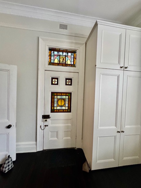 Heritage front door with original stained glass panels in a Sydney home